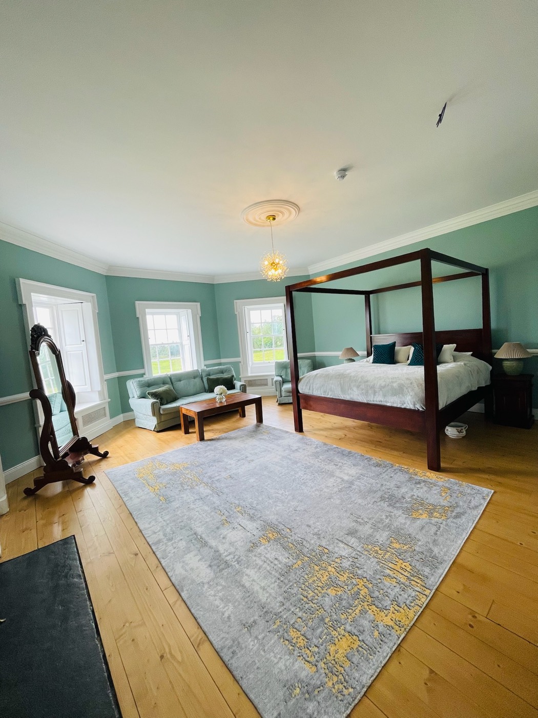 A principal bedroom at Newhall with a four-poster bed