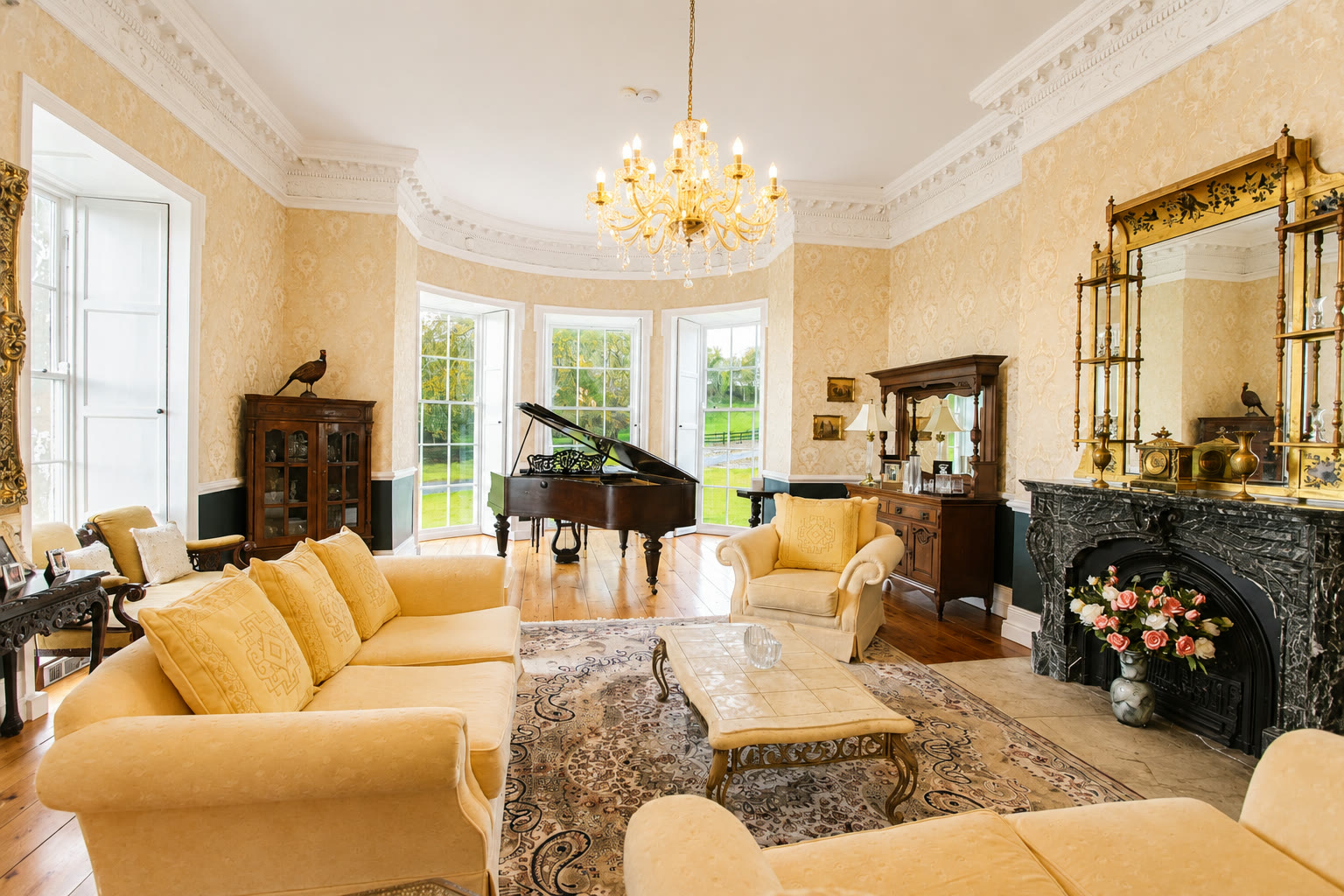 The drawing room at Newhall with a grand piano in the bow window